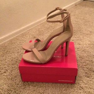 Nude patent leather strap heels